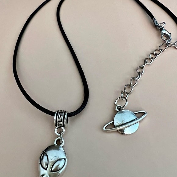 Planetary Visitor Alien Head Necklace on a Black Cord with Saturn Charm ending - Picture 5 of 10
